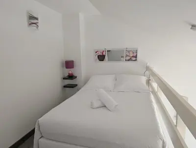 Un ou plusieurs lits dans un hébergement de l'établissement Maison dans résidence avec piscine et tennis - 4 personnes