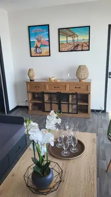 Coin salon dans l'établissement Appartement de charme, face à l'ocean