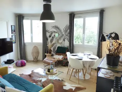 Coin salon dans l'établissement PROCE - Apt lumineux et cosy, vue parc de Procé