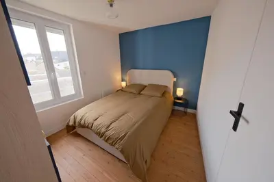 Un ou plusieurs lits dans un hébergement de l'établissement Appartement cosy en centre ville de Cholet