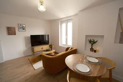 Télévision ou salle de divertissement dans l'établissement Appartement cosy en centre ville de Cholet