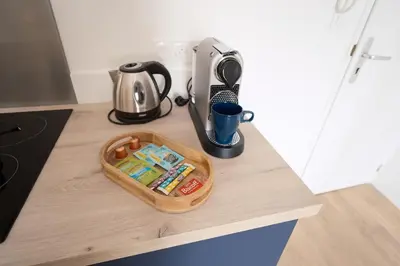 Cuisine ou kitchenette dans l'établissement Appartement cosy en centre ville de Cholet