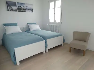 Un ou plusieurs lits dans un hébergement de l'établissement Oasis