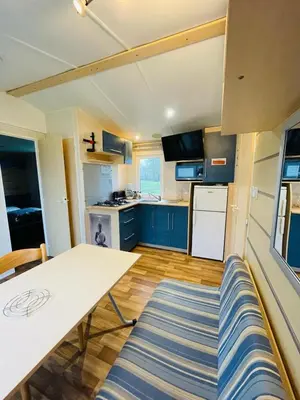 Cuisine ou kitchenette dans l'établissement Loggia Confort Clim 2ch 5per Puy du Fou