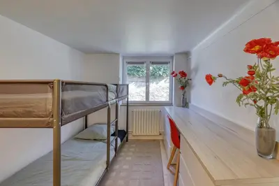 Un ou plusieurs lits dans un hébergement de l'établissement Maison Spacieuse idéalement placée bord de mer