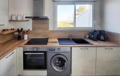 Cuisine ou kitchenette dans l'établissement Villa Avec Piscine Privée
