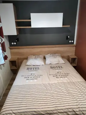Un ou plusieurs lits dans un hébergement de l'établissement Jolie Mobil Home climatisé 58