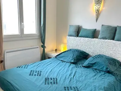 Un ou plusieurs lits dans un hébergement de l'établissement Appartement lumineux 2 chambres face mer à Saint-Jean-de-Monts - FR-1-652-54