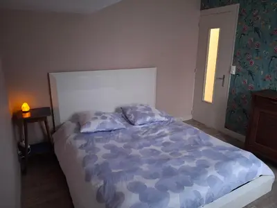 Un ou plusieurs lits dans un hébergement de l'établissement Chambre lit double près de la Loire