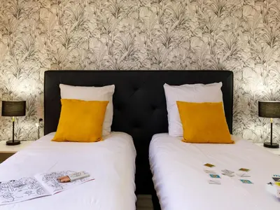 Un ou plusieurs lits dans un hébergement de l'établissement Holiday Home Remagy by Interhome
