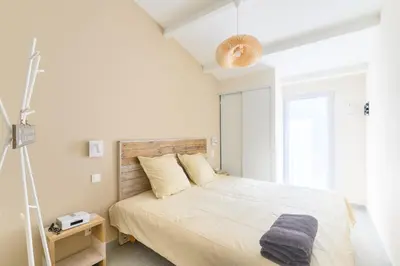 Un ou plusieurs lits dans un hébergement de l'établissement Lovely fully renovated beach villa