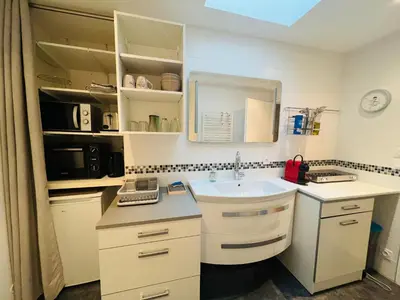 Cuisine ou kitchenette dans l'établissement La grange