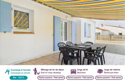 Restaurant ou autre lieu de restauration dans l'établissement Maison de vacances pour 4, St-Hilaire-de-Riez