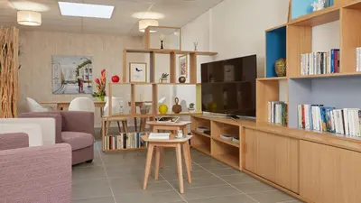 Coin salon dans l'établissement Zenao Appart'hôtels Challans