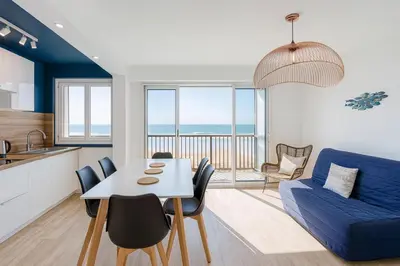 Coin salon dans l'établissement Appartement vue océan