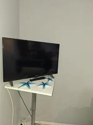 Télévision ou salle de divertissement dans l'établissement Au Cœur De Chateaubriant WIFI-Centre-Ville-RDC