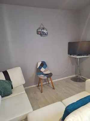 Télévision ou salle de divertissement dans l'établissement Au Cœur De Chateaubriant WIFI-Centre-Ville-RDC
