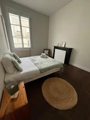 Un ou plusieurs lits dans un hébergement de l'établissement Appartment Doutre-2e étage