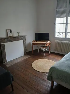 Télévision ou salle de divertissement dans l'établissement Appartment Doutre-2e étage