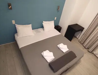 Un ou plusieurs lits dans un hébergement de l'établissement Hôtel De La Gare Nantes Station Hotel Nantes