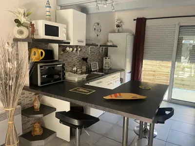 Cuisine ou kitchenette dans l'établissement Lasko