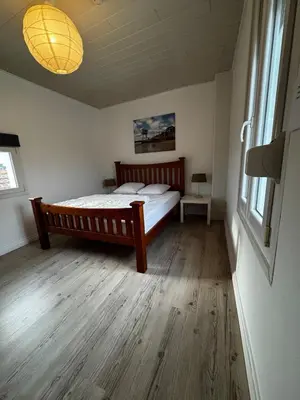 Un ou plusieurs lits dans un hébergement de l'établissement Maison 47m2 meublée 200m plage