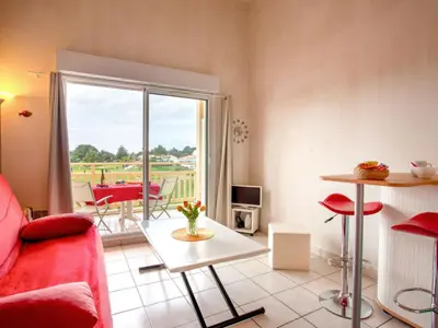 Coin salon dans l'établissement Apartment L'Orée du Golf-2 by Interhome