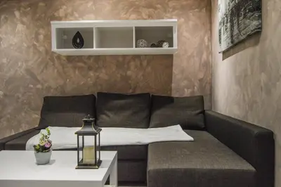 Coin salon dans l'établissement Au domaine de la maisonnette