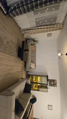 Coin salon dans l'établissement Chambre