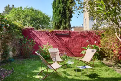 Jardin de l'établissement Le Jardin Secret - 2 chambres & Parking Offert