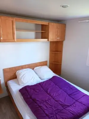 Un ou plusieurs lits dans un hébergement de l'établissement Mobil home LA BAULE 437