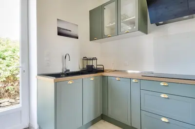 Cuisine ou kitchenette dans l'établissement Maison avec jardin pour 4 - 800m de la plage