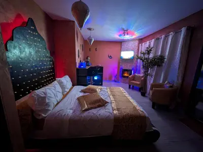 Un ou plusieurs lits dans un hébergement de l'établissement 1000 et une Nuit