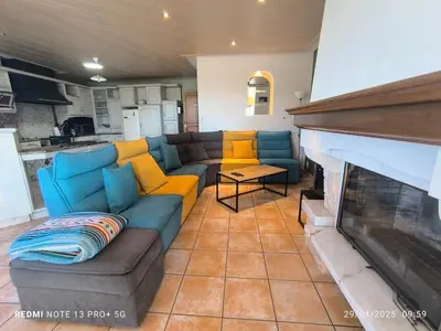 Coin salon dans l'établissement Le Gîte du Côteau - 14 personnes - 15mn du Parc