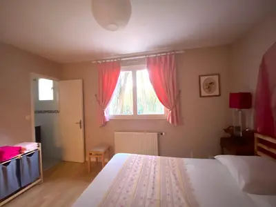 Un ou plusieurs lits dans un hébergement de l'établissement La Cachette d Oona, Grand gîte nature et familles