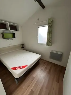 Un ou plusieurs lits dans un hébergement de l'établissement Mobile home 6 personnes 1semaine minimum juillet août