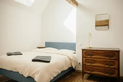 Un ou plusieurs lits dans un hébergement de l'établissement Pied à Terre