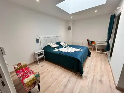 Un ou plusieurs lits dans un hébergement de l'établissement Chambres d'hôtes LA GRANGE DU PA de LA GROLLE