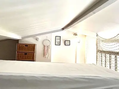 Un ou plusieurs lits dans un hébergement de l'établissement Appartement rénové 2 pièces proche plage - La Guérinière - FR-1-224B-241