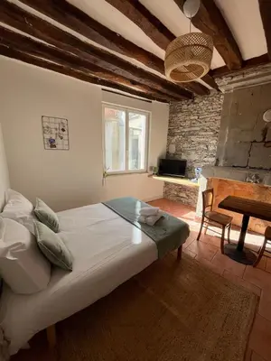 Un ou plusieurs lits dans un hébergement de l'établissement Studio CENTRE VILLE ANGERS 1ER ETAGE - 2 PERSONNES