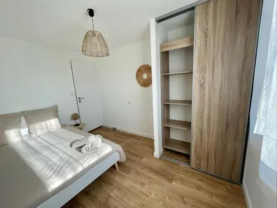 Un ou plusieurs lits dans un hébergement de l'établissement Spacious house for up to 10 people in Vertou