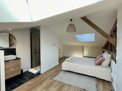 Un ou plusieurs lits dans un hébergement de l'établissement Spacious house for up to 10 people in Vertou