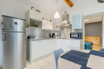Cuisine ou kitchenette dans l'établissement Le 113 Dunes - Jardin parking proche plage