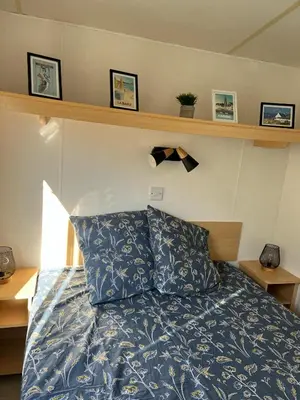 Un ou plusieurs lits dans un hébergement de l'établissement Mobil-home 5 personnes