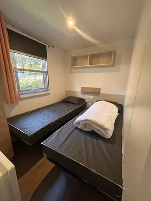 Un ou plusieurs lits dans un hébergement de l'établissement Mobilhome Calme 6 Personnes Camping Pierre Couché