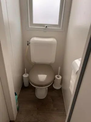 Salle de bains dans l'établissement Mobilhome Calme 6 Personnes Camping Pierre Couché