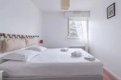 Un ou plusieurs lits dans un hébergement de l'établissement Appartement à 200 m from ThalassoSpa