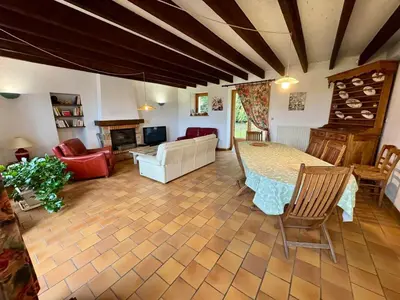 Coin salon dans l'établissement Grande Maison au Calme