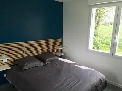 Un ou plusieurs lits dans un hébergement de l'établissement Balcon sur l'èvre