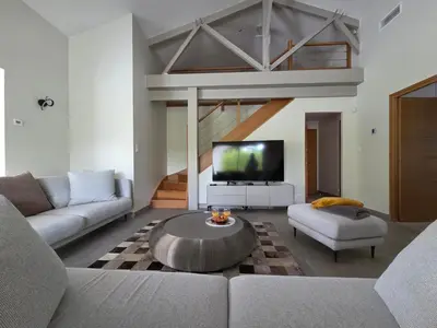 Télévision ou salle de divertissement dans l'établissement Villa d'Exception avec Hammam et Sauna à Saint-Brevin-l’Océan - FR-1-364-179